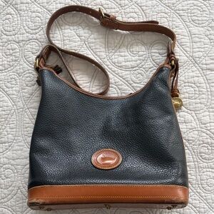 Dooney & Bourke Black and Tan Pebbled Leather Shoulder Bag